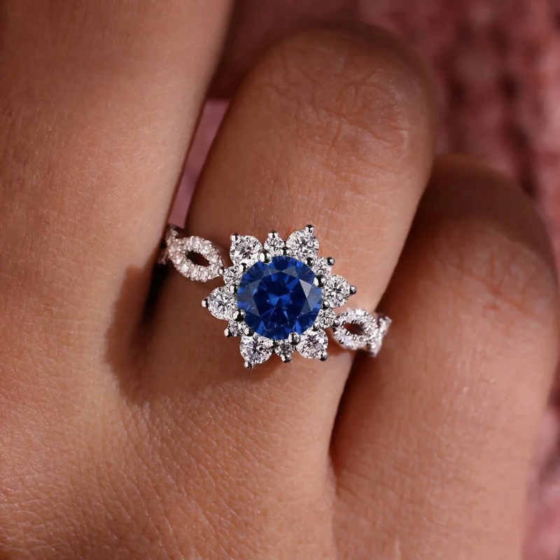 Anillo floral de cristal y zafiro | Oro blanco