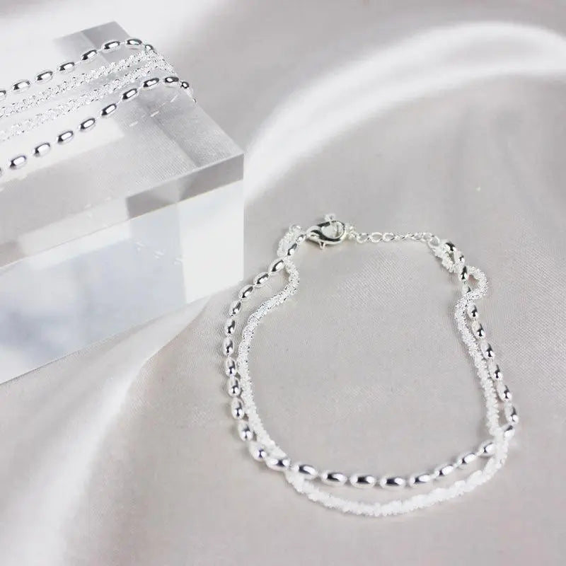 Amparo – Elegante conjunto de pulseras de plata con circonitas
