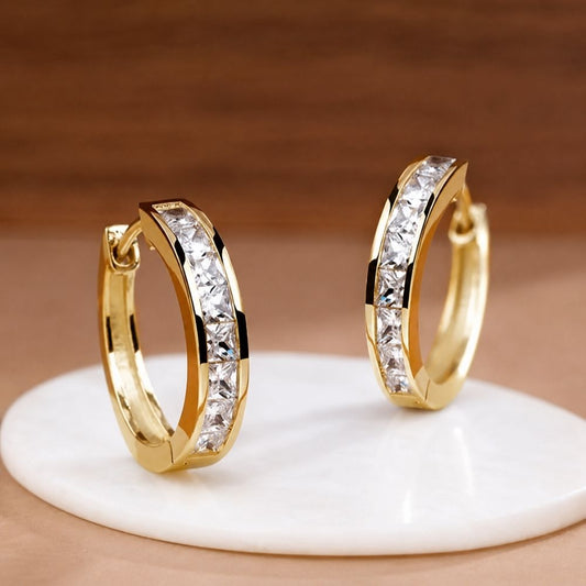 Elegantes pendientes de oro y cristal