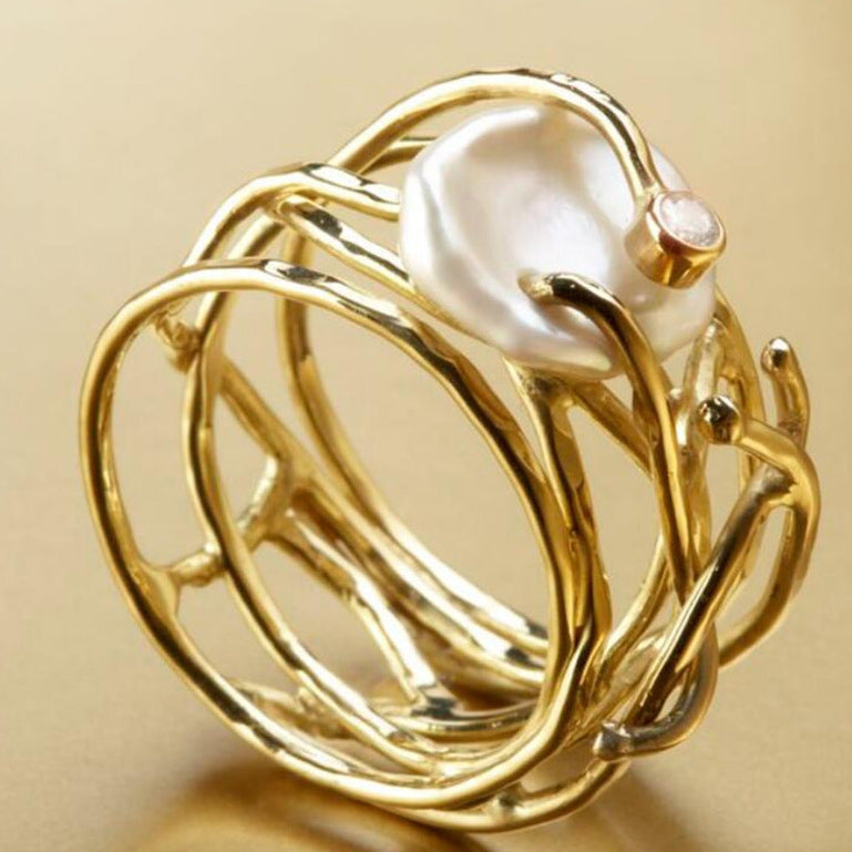 ANILLO PERLA ORGÁNICA DORADA