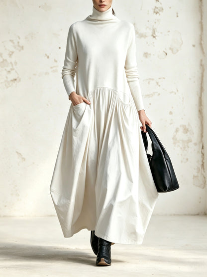 Ana | Vestido maxi oversize negro con cuello alto y bolsillos