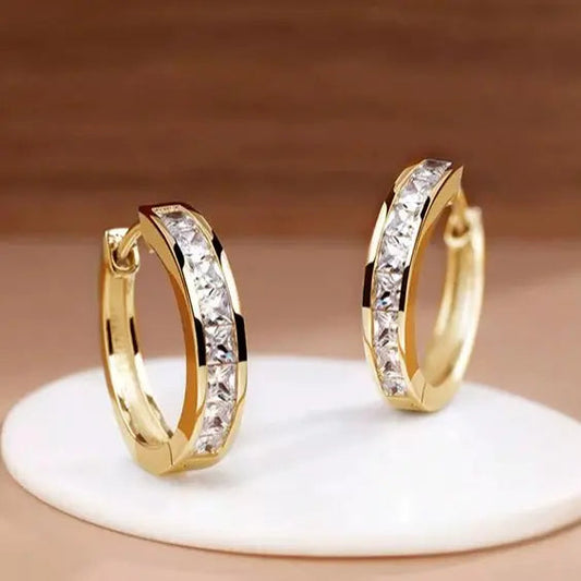 Montserrat – Elegantes pendientes redondos de oro y cristal